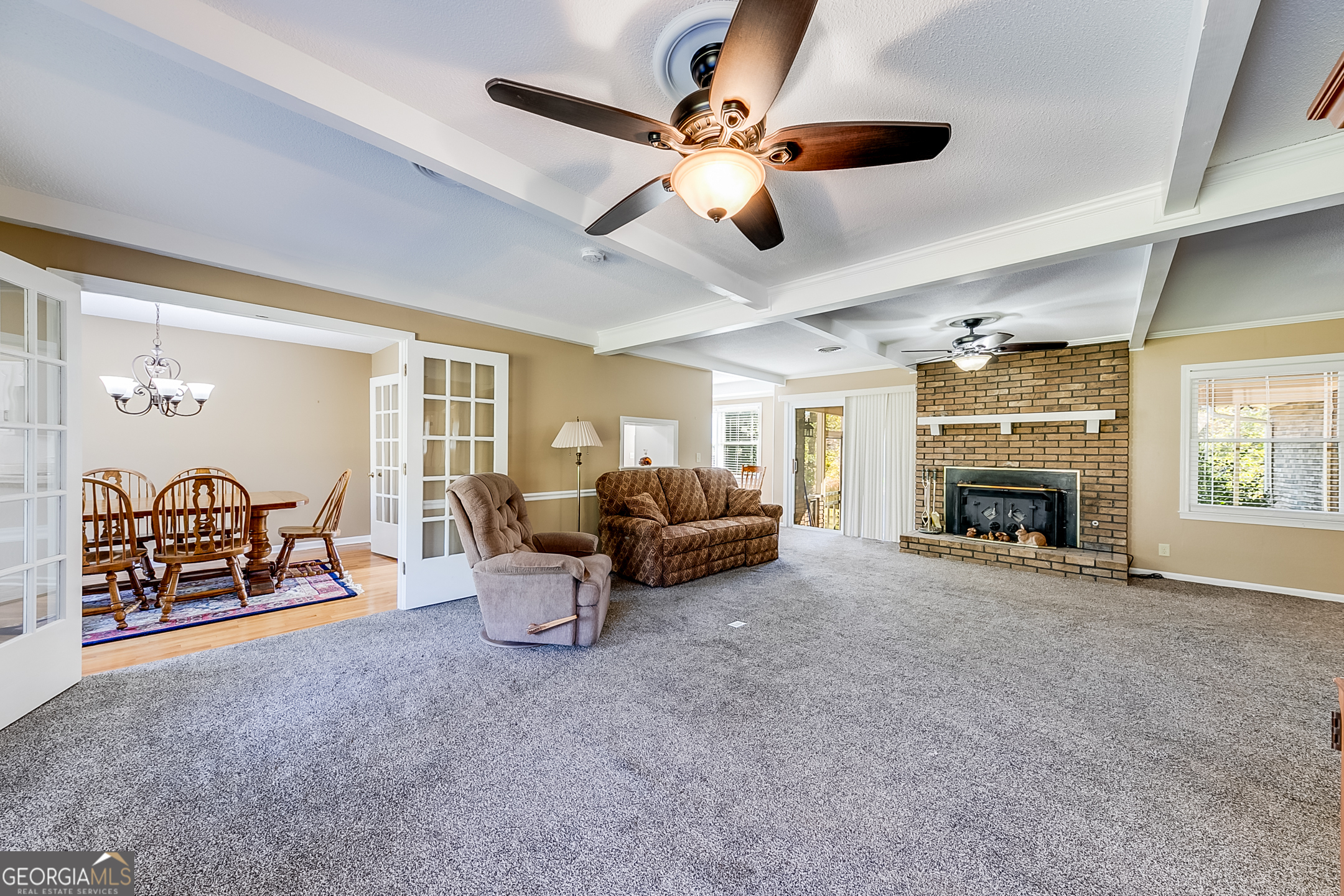 1174 Hospital Road Commerce, GA 30529 - Photo 10 of 40 a living room with furniture and a fireplace