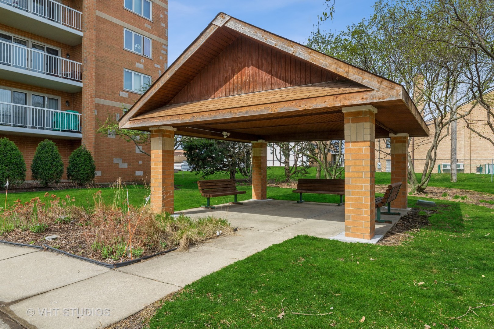 7450 North Waukegan Road, Unit 405 Niles, IL 60714 - Photo 15 of 15 a view of a house with backyard and garden