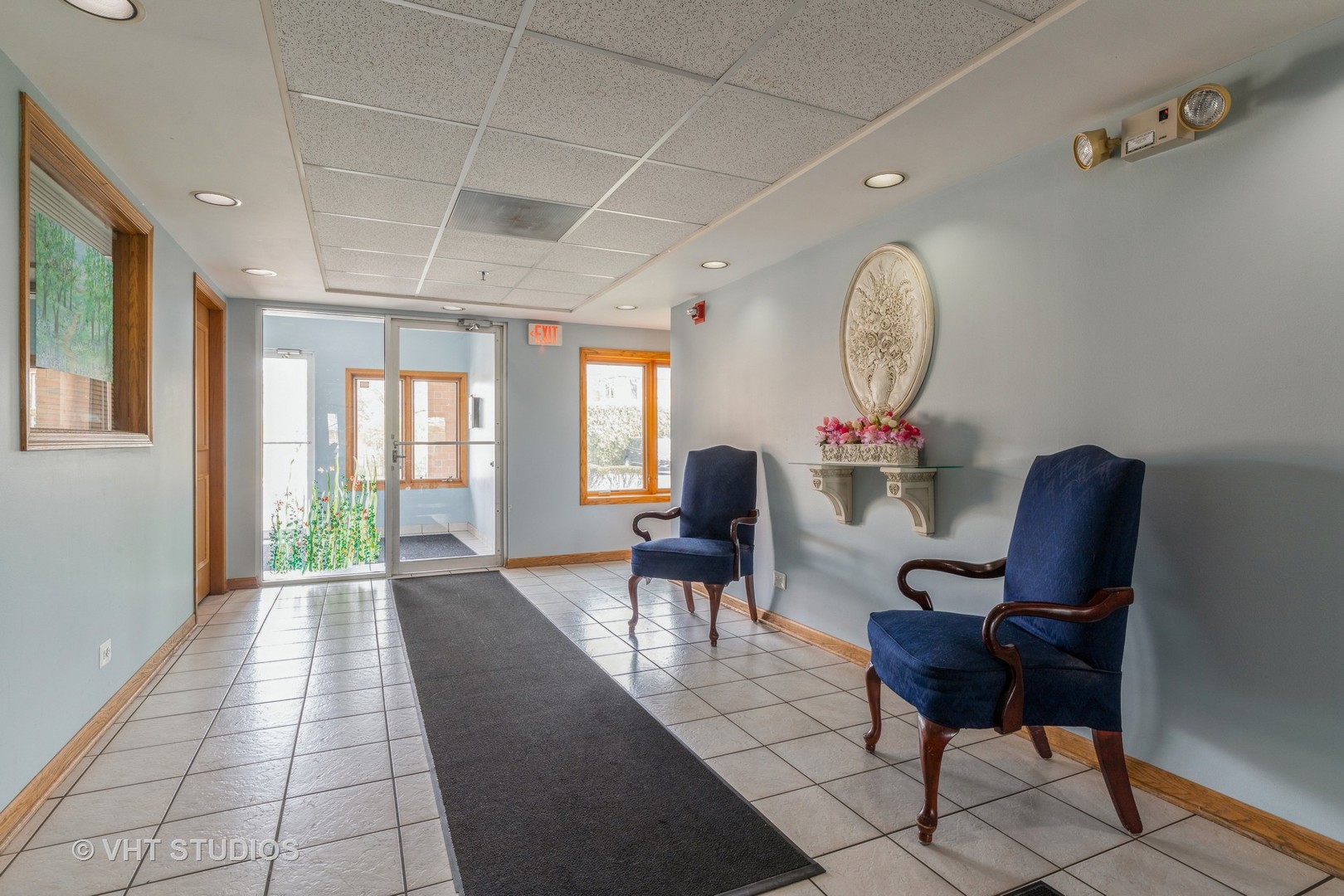 7450 North Waukegan Road, Unit 405 Niles, IL 60714 - Photo 2 of 15 a living room with furniture