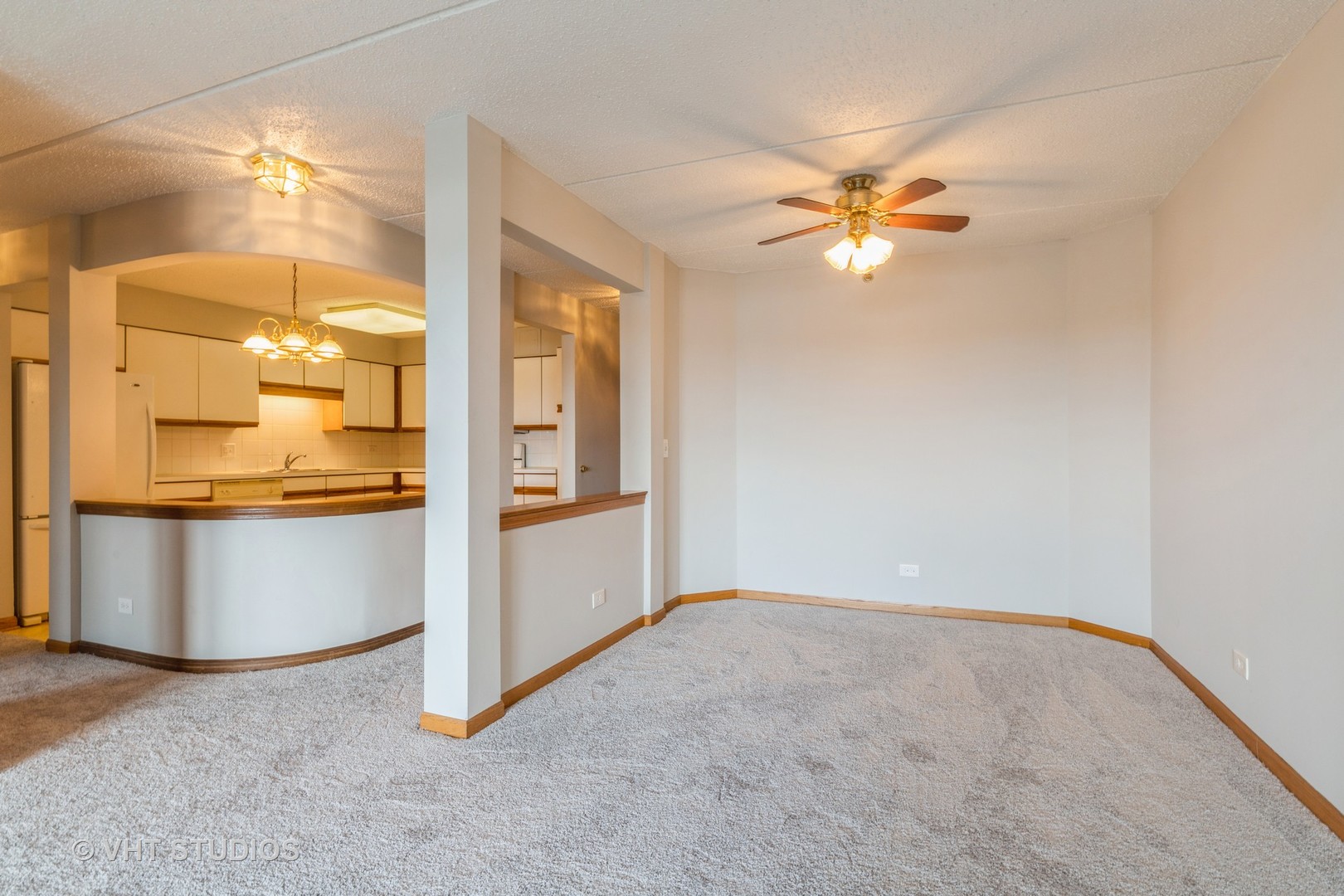 7450 North Waukegan Road, Unit 405 Niles, IL 60714 - Photo 7 of 15 a very nice looking room with a ceiling fan