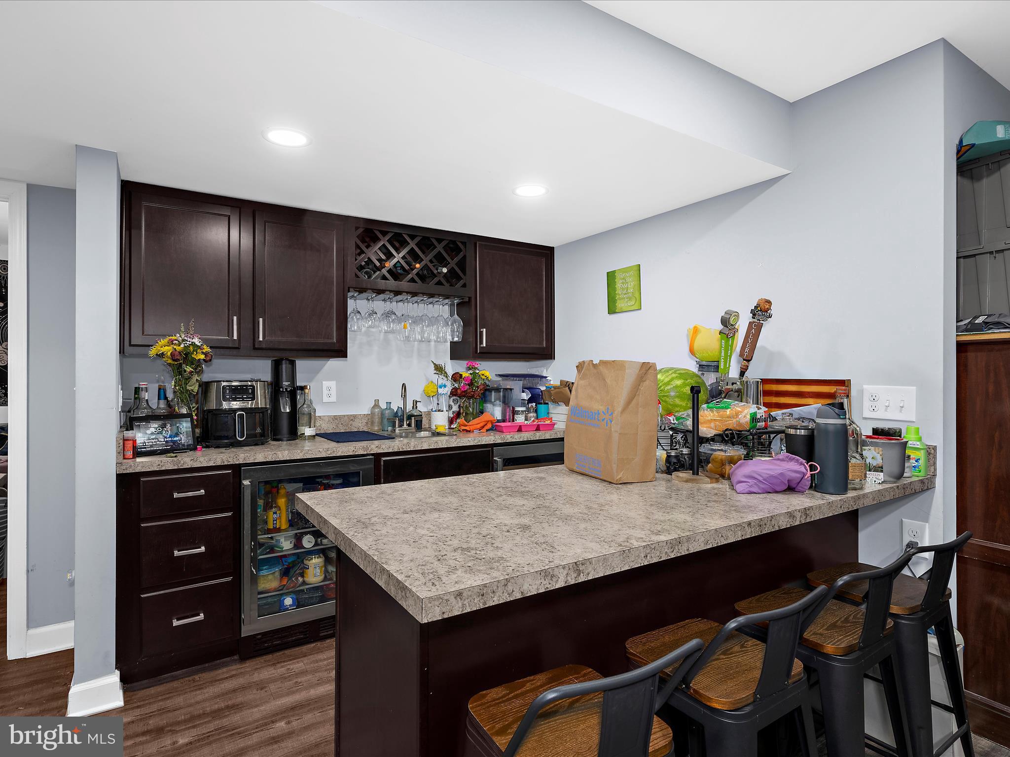 249 Double Oak Road Prince Frederick, MD 20678 - Photo 22 of 30 a kitchen with granite countertop kitchen island stainless steel appliances a sink and counter space