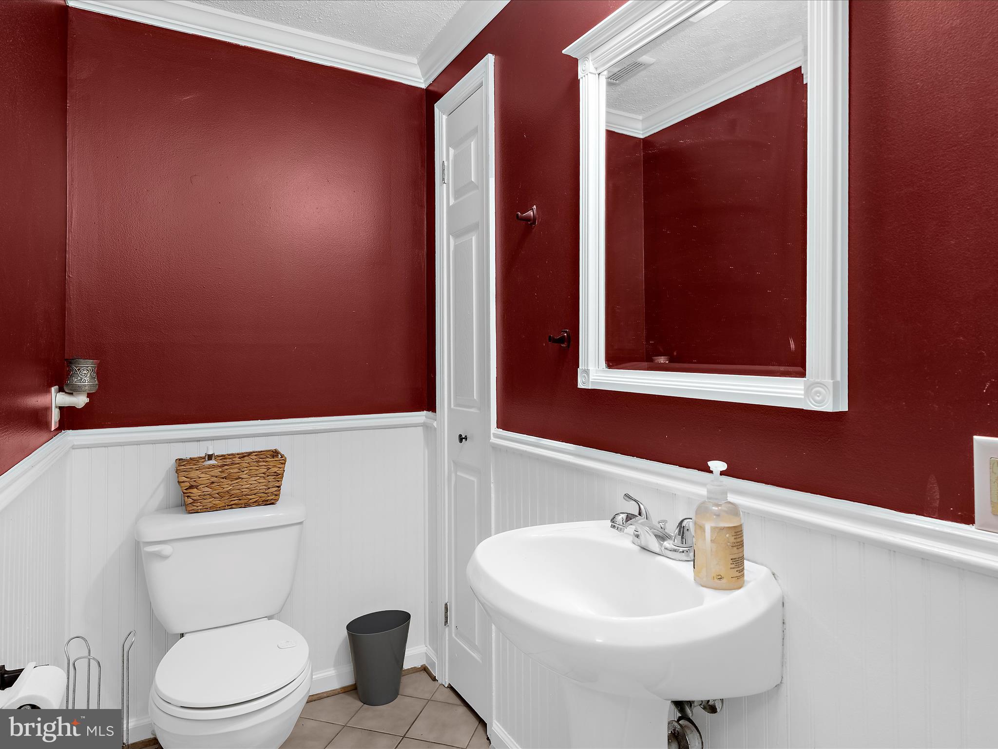 249 Double Oak Road Prince Frederick, MD 20678 - Photo 3 of 30 a bathroom with a sink a toilet and mirror