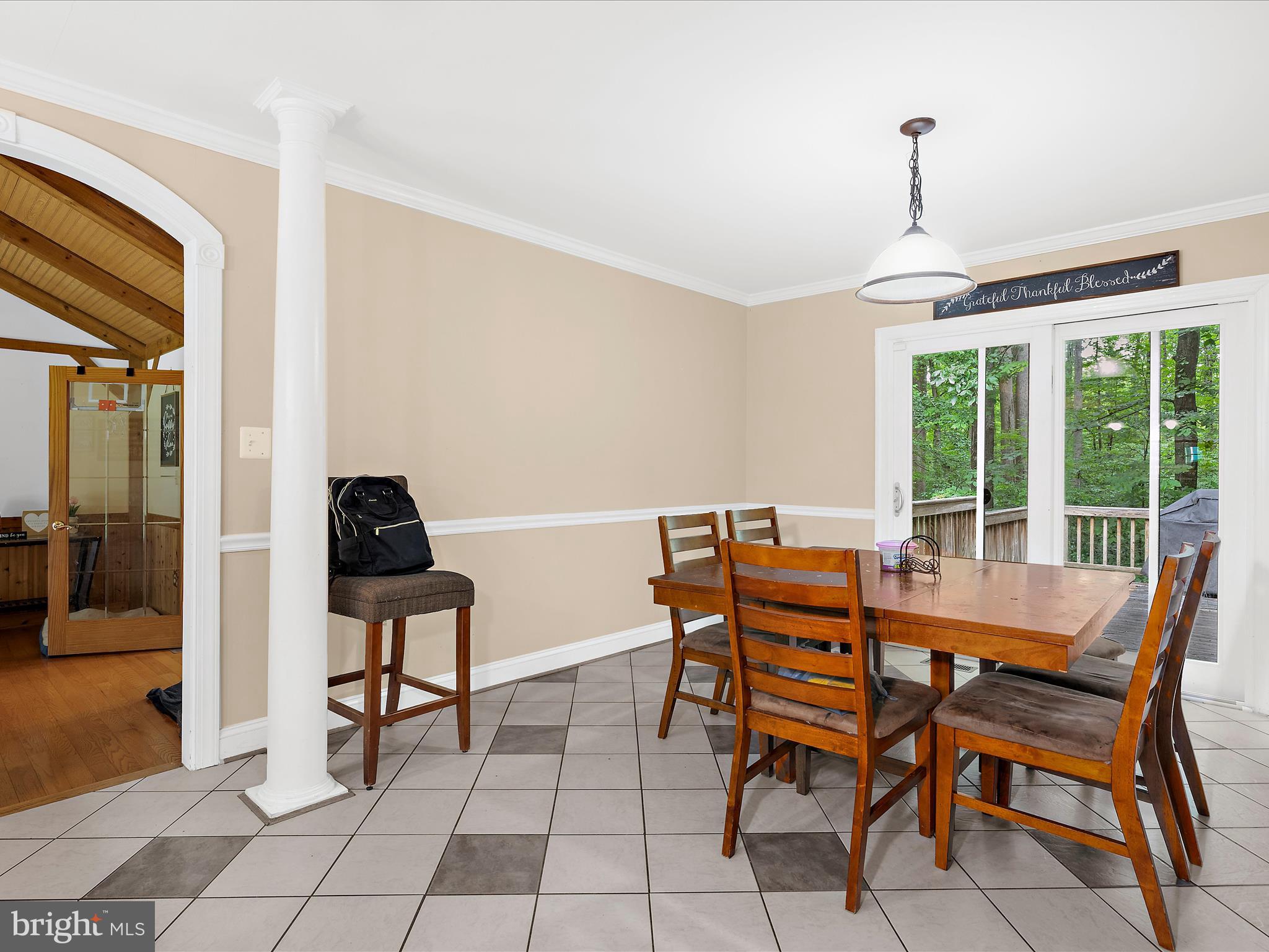 249 Double Oak Road Prince Frederick, MD 20678 - Photo 5 of 30 a dining room with furniture a chandelier and wooden floor