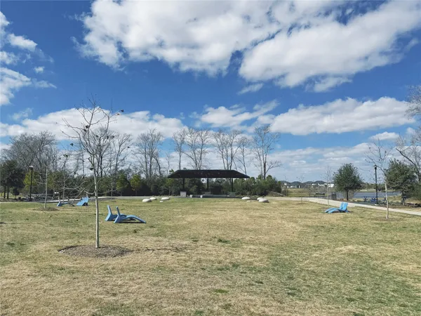 a sign that is in front of flowers