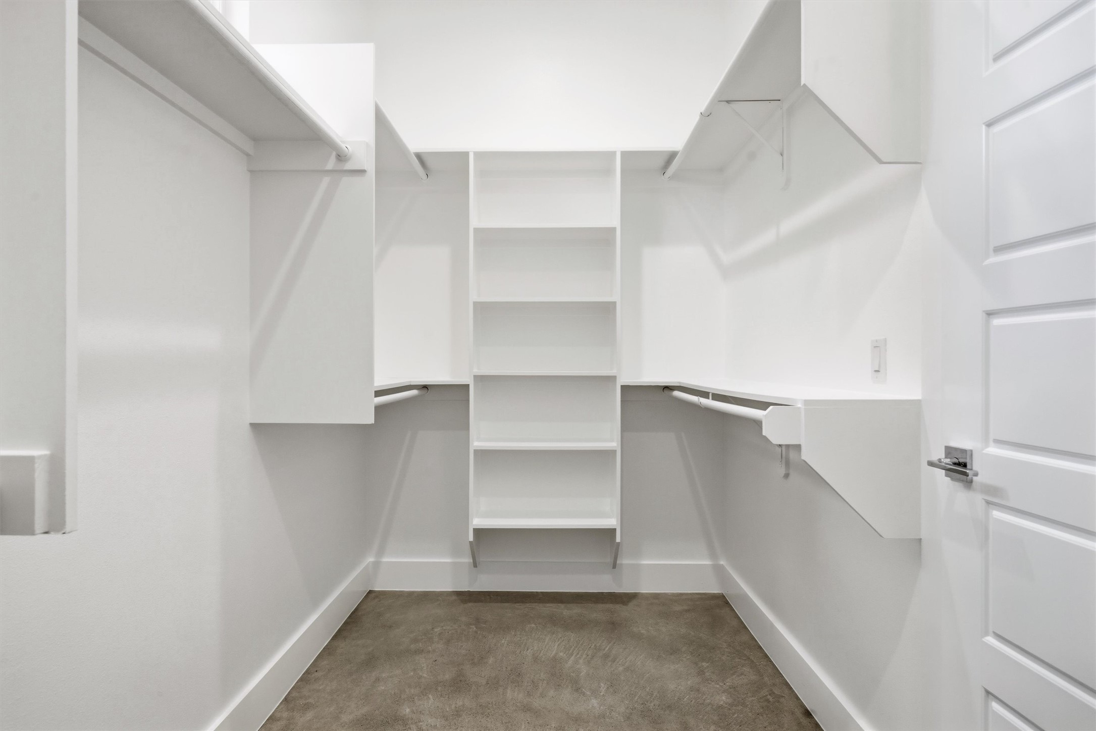 1210 Stobaugh Street, Unit B Austin, TX 78757 - Photo 22 of 40 Ample shelving and hanging space defines this well-organized walk-in closet.