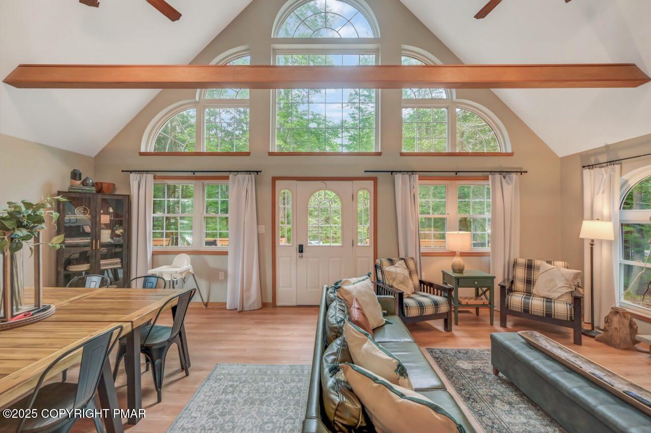 238 King Arthur Road Pocono Lake, PA 18347 - Photo 16 of 95 a view of a dining room with furniture window and outside view