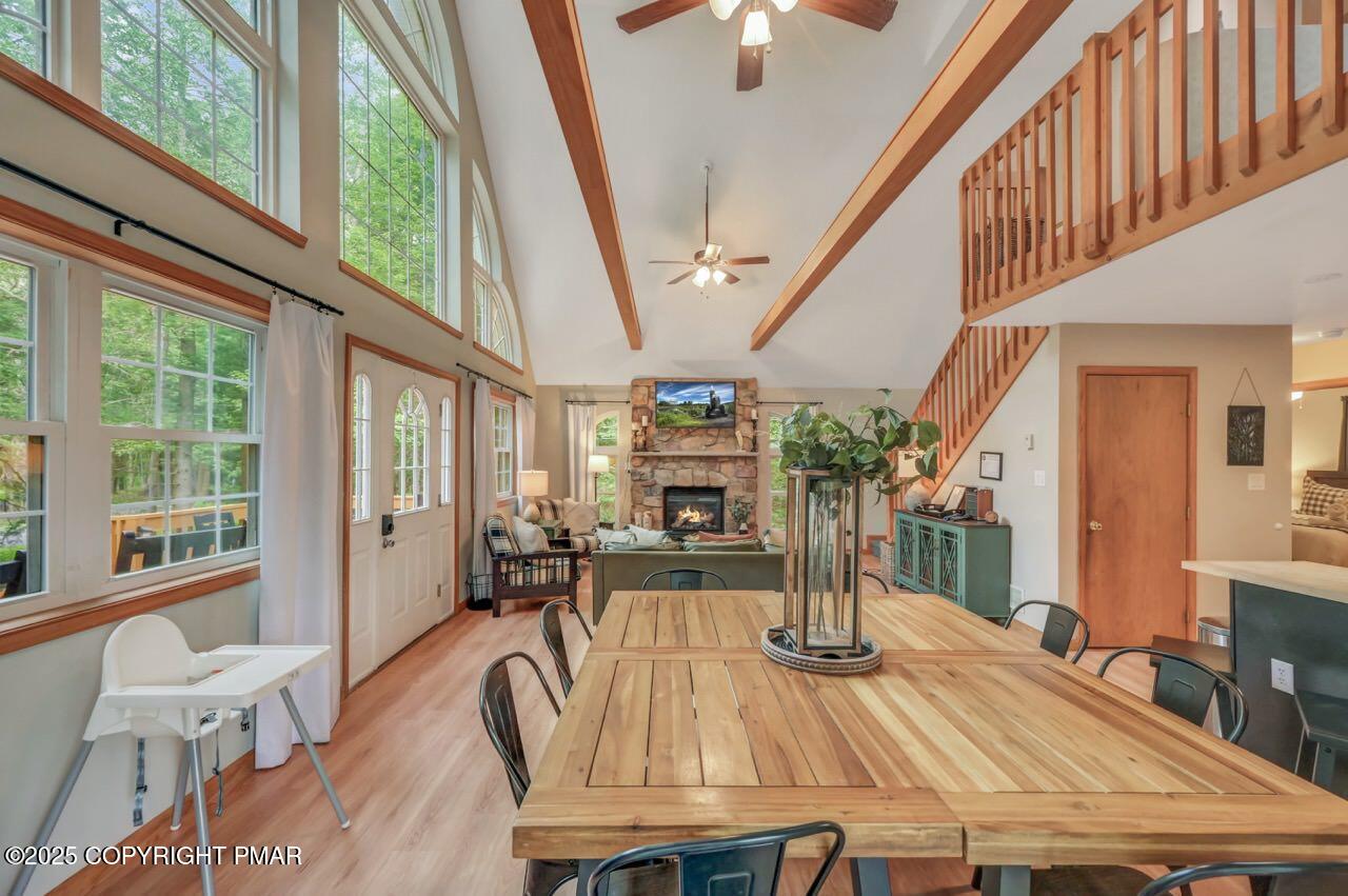 238 King Arthur Road Pocono Lake, PA 18347 - Photo 18 of 95 a view of a dining room with furniture window and wooden floor