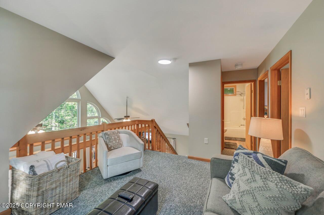 238 King Arthur Road Pocono Lake, PA 18347 - Photo 49 of 95 a living room with furniture and a window
