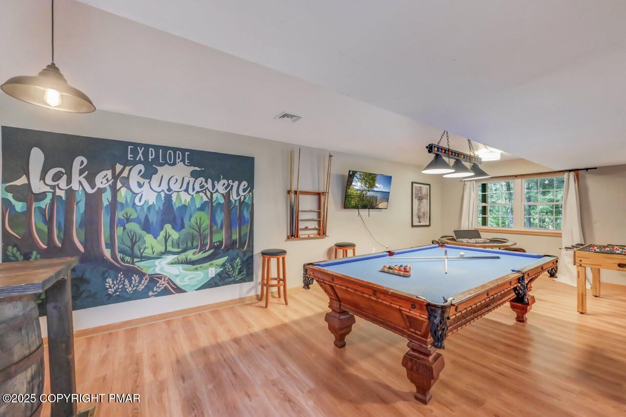 238 King Arthur Road Pocono Lake, PA 18347 - Photo 60 of 95 a living room with pool table and a flat screen tv