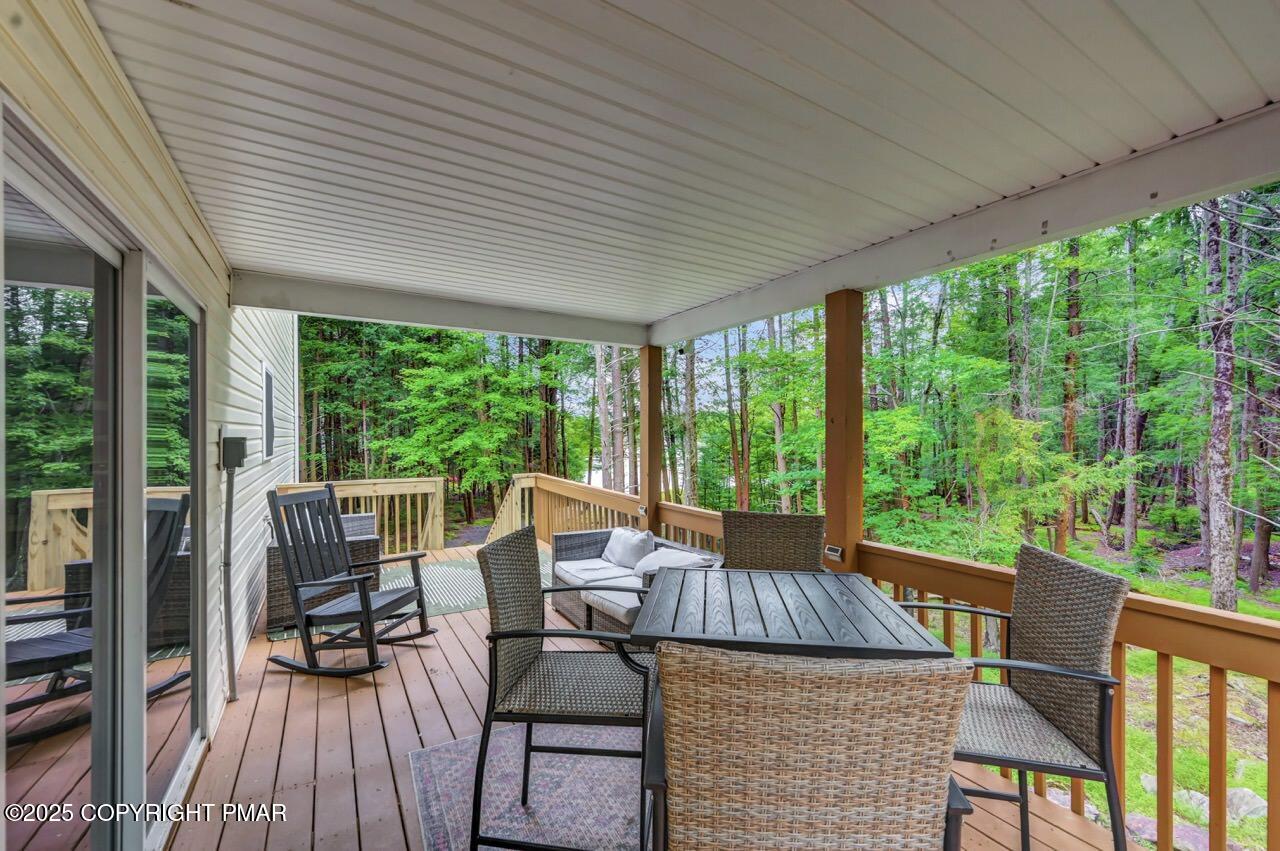 238 King Arthur Road Pocono Lake, PA 18347 - Photo 76 of 95 a view of a patio on the deck