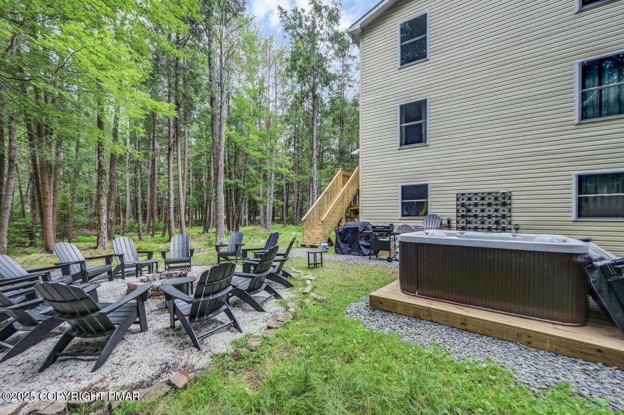 238 King Arthur Road Pocono Lake, PA 18347 - Photo 80 of 94 Exterior Fire pit & Hot tub