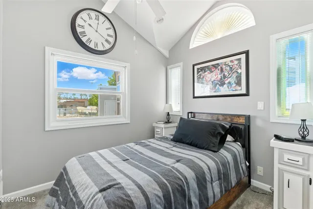 a view of a livingroom with workspace and a couch