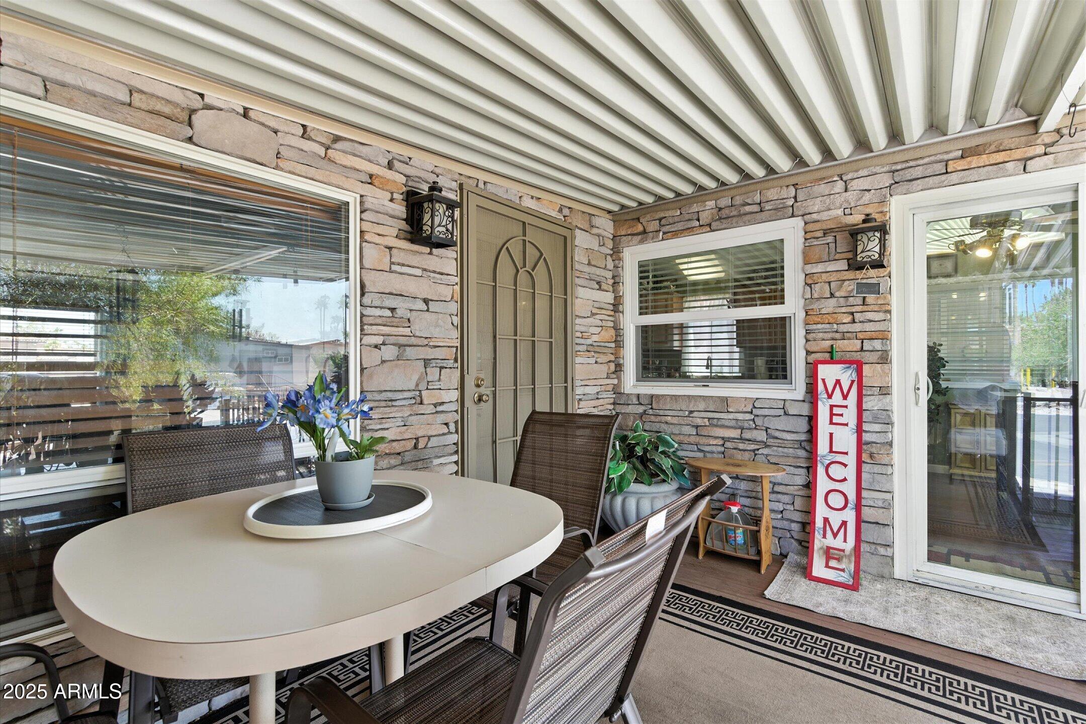 2366 East Pima Avenue Apache Junction, AZ 85119 - Photo 20 of 22 a dining room with furniture and window