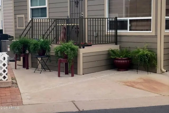 a backyard of a house with plants