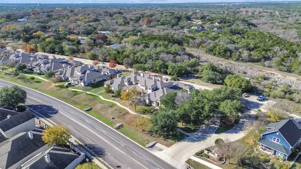 an aerial view of a house with a garden