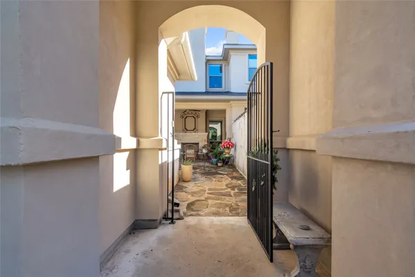 a view of a living room with a fireplace