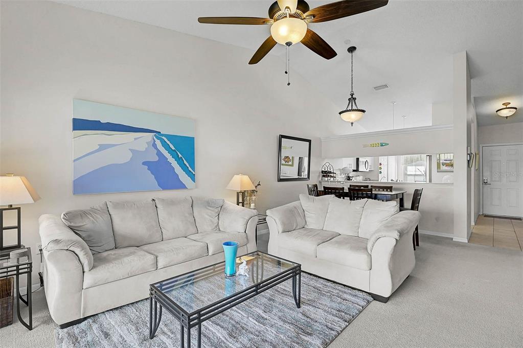 4706 Sand Trap St Circle, Unit 202 Bradenton, FL 34203 - Photo 14 of 33 a living room with furniture