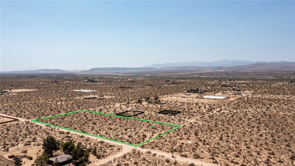 1448 Columbus Road Landers, CA 92285 - Photo 8 of 18 an aerial view of residential building and ocean