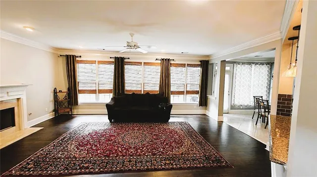 a kitchen with stainless steel appliances granite countertop a refrigerator stove microwave and sink