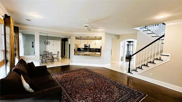 a living room with a couch and a fireplace