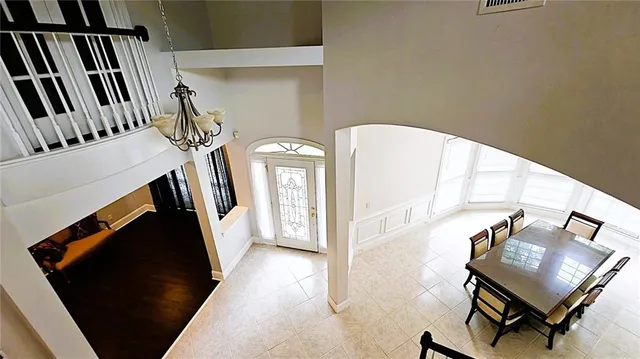 a white toilet sitting next to a bathroom sink
