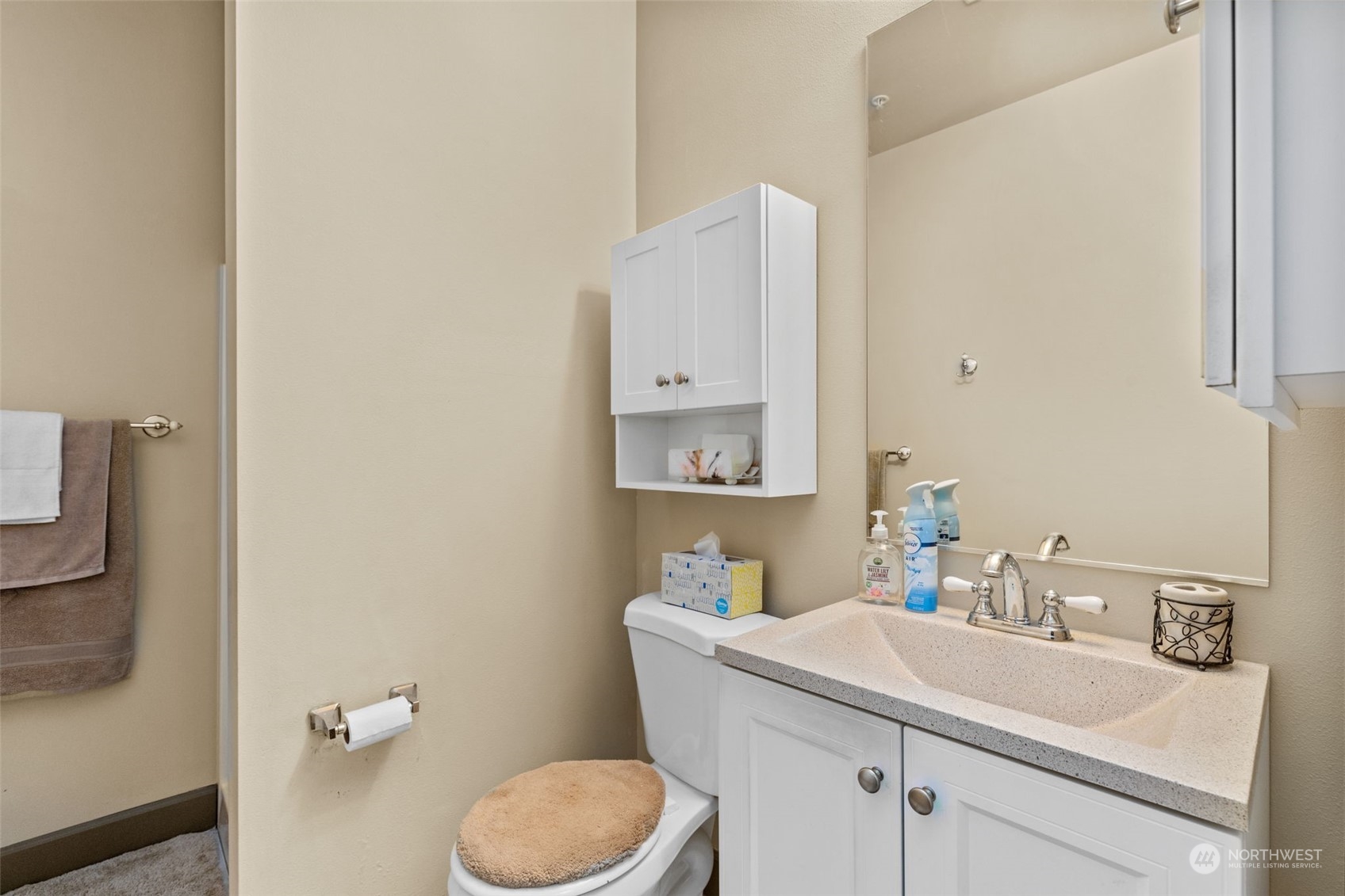 2115 201st Place Southeast, Unit D1 Bothell, WA 98012 - Photo 19 of 33 a bathroom with a sink toilet and mirror