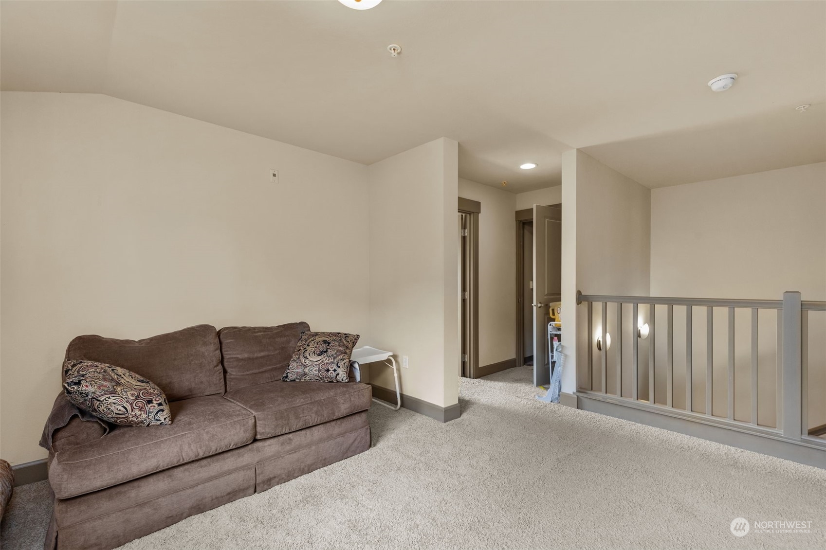 2115 201st Place Southeast, Unit D1 Bothell, WA 98012 - Photo 21 of 33 a living room with furniture and a ceiling fan