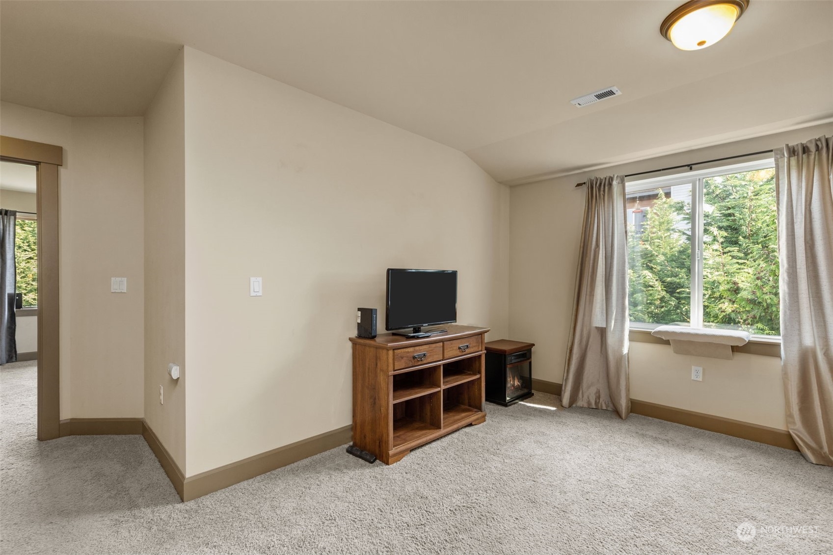 2115 201st Place Southeast, Unit D1 Bothell, WA 98012 - Photo 23 of 33 a view of a livingroom with furniture and a window