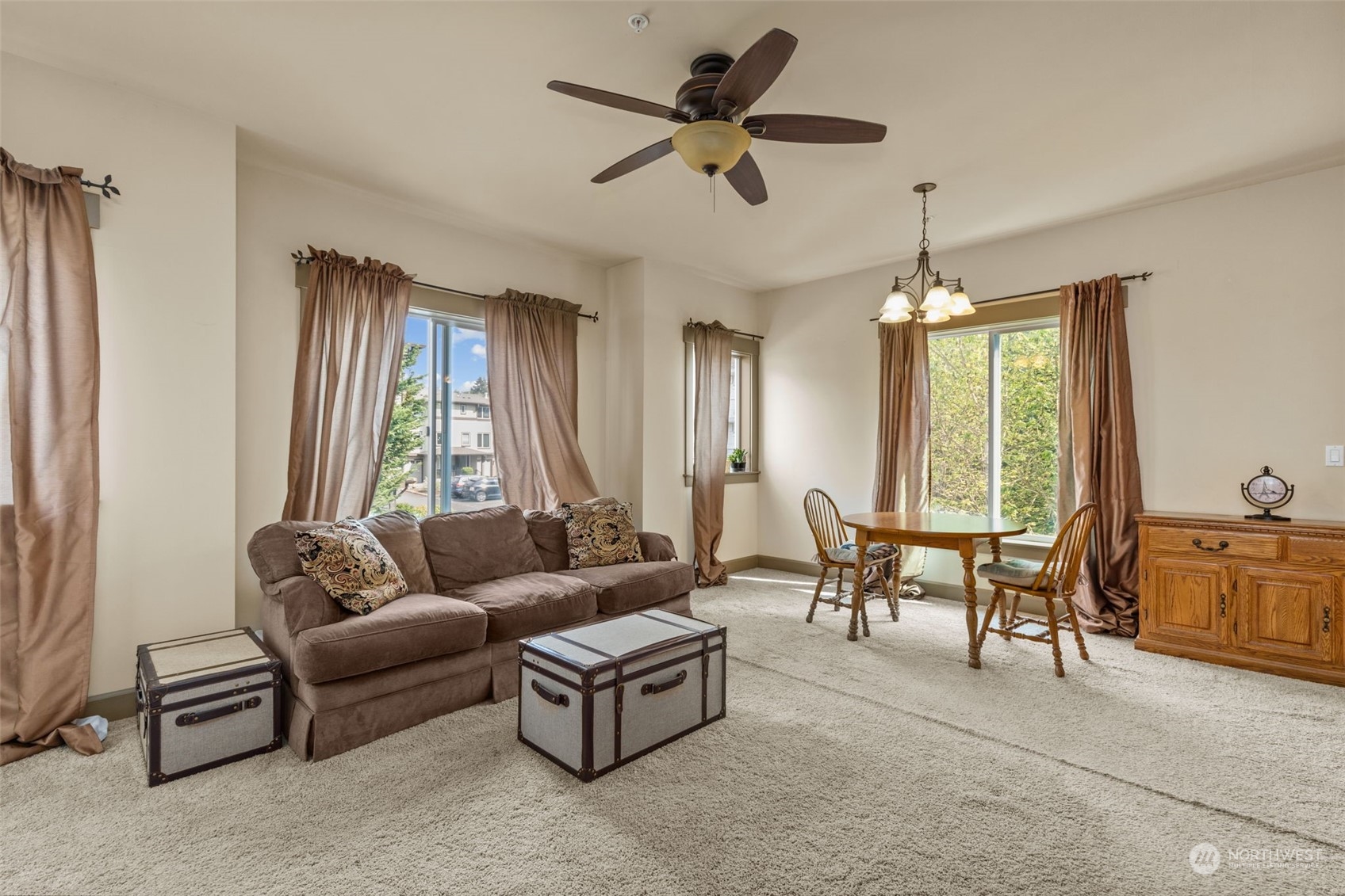 2115 201st Place Southeast, Unit D1 Bothell, WA 98012 - Photo 4 of 33 a living room with furniture and a large window
