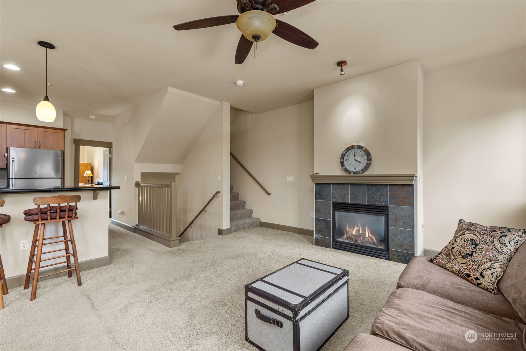 2115 201st Place Southeast, Unit D1 Bothell, WA 98012 - Photo 5 of 33 a living room with furniture and a fireplace