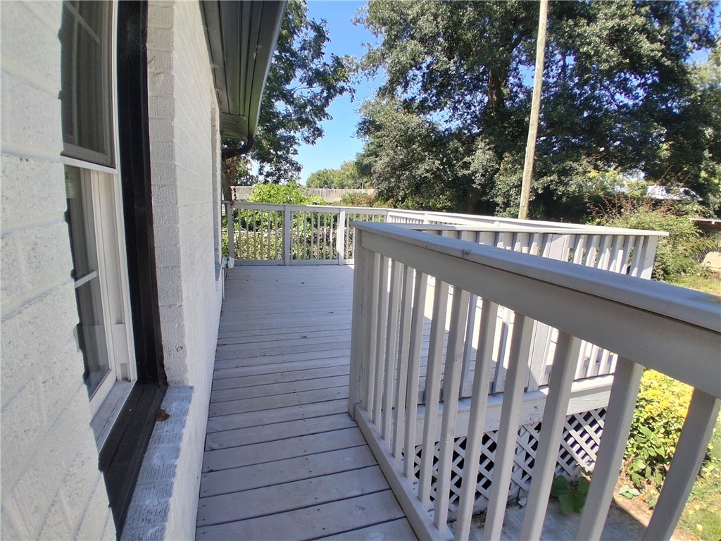 506 Pinckney Street Greenville, SC 29601 - Photo 28 of 29 Expansive back deck overlooking the fenced yard — ideal for morning coffee or evening relaxation.