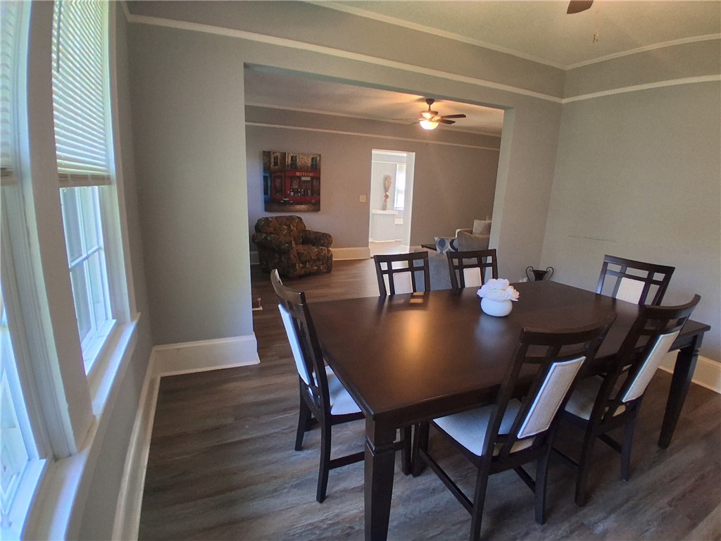 506 Pinckney Street Greenville, SC 29601 - Photo 10 of 29 Bright dining space with natural light and easy flow into the living area