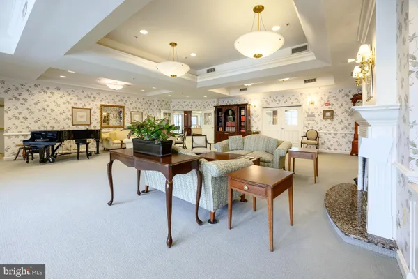 a room with furniture and a large window