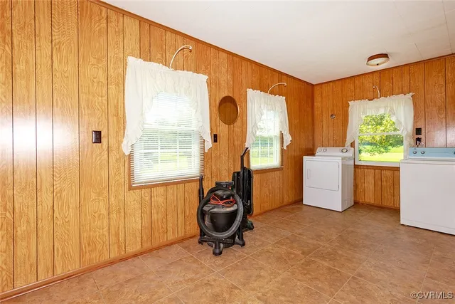 a view of a room with gym equipment and a window