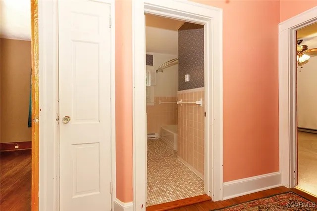 a view of bathroom with a shower and a sink