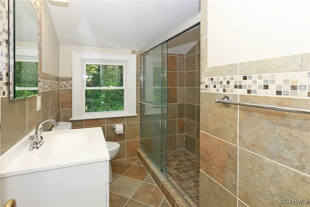 a bathroom with a sink and a shower