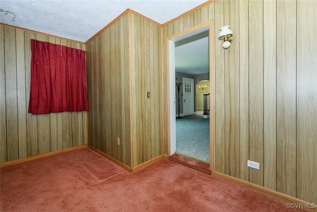 a view of a bathroom with a mirror
