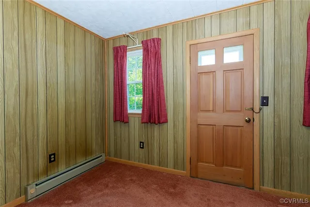 a view of a kitchen from the hallway