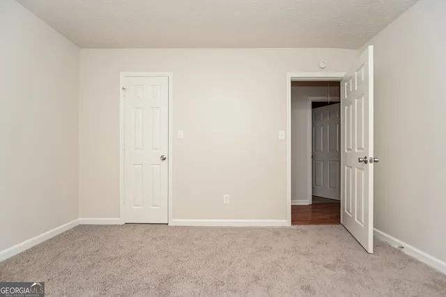 an empty room with closet