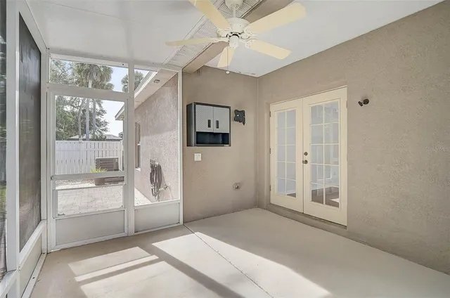 a view of an empty room and window