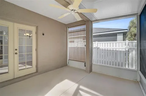 a view of a room with wooden floor and balcony
