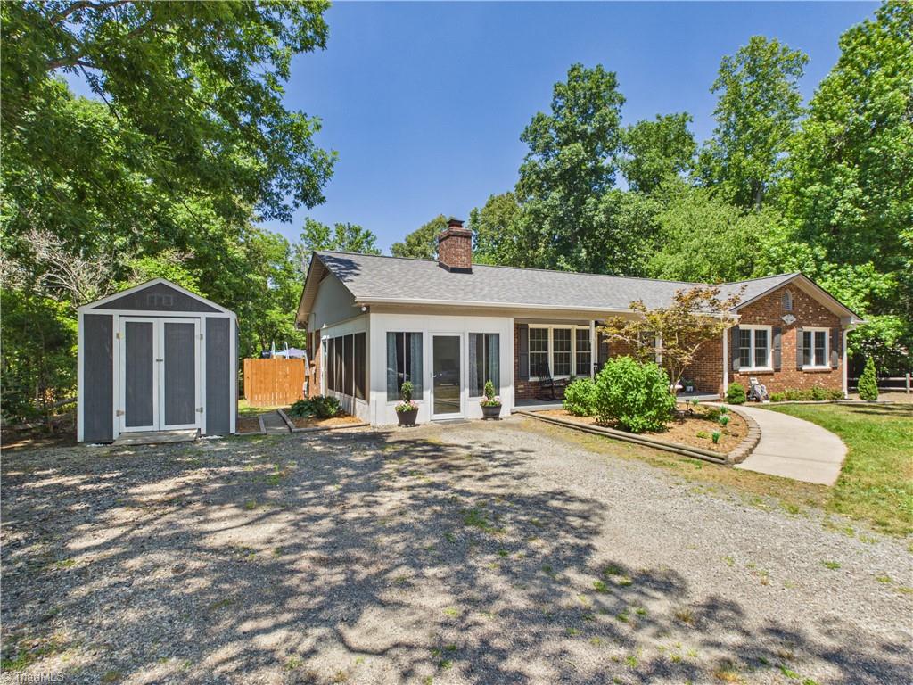 4332 Brandy Road Greensboro, NC 27407 - Photo 33 of 35 Great space with finished area for a sunroon