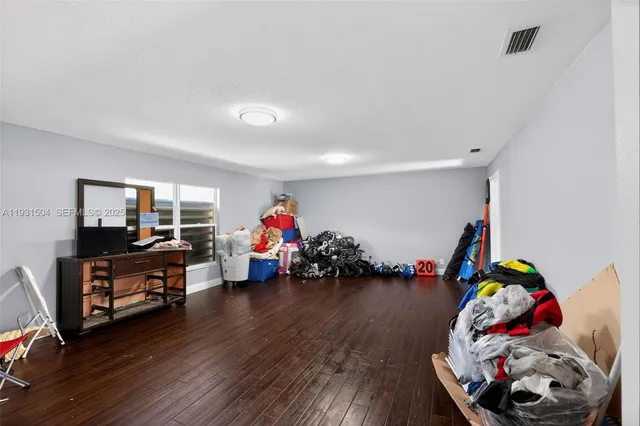 a children room with toys and wooden floor
