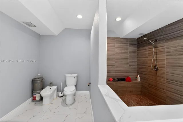 a bathroom with a sink and a toilet