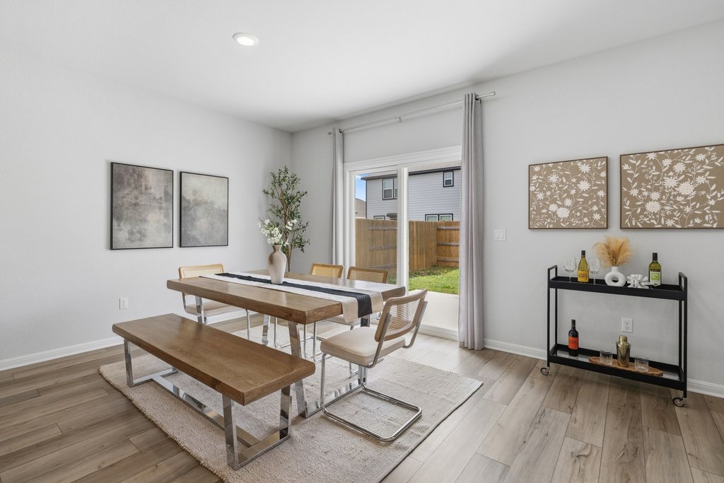 8001 Andravida Drive Austin, TX 78747 - Photo 18 of 35 Bright dining area with backyard views