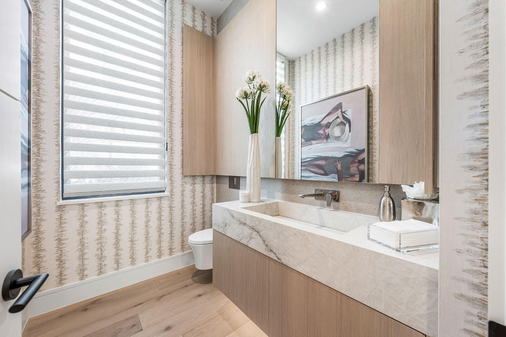 481 Thatch Palm Drive Boca Raton, FL 33432 - Photo 48 of 98 a bathroom with a sink a mirror and a window