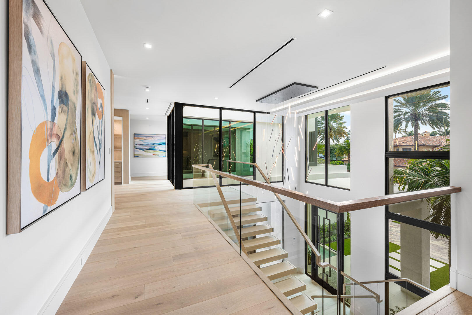 481 Thatch Palm Drive Boca Raton, FL 33432 - Photo 52 of 98 a view of an entryway with wooden floor