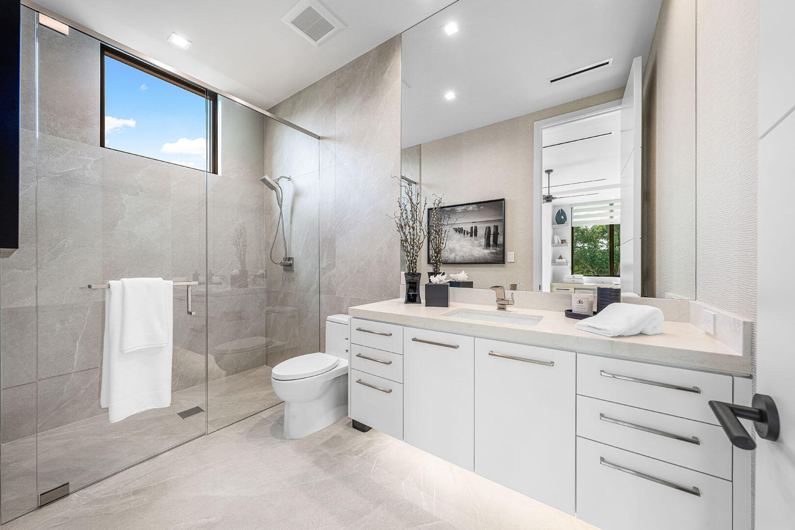 481 Thatch Palm Drive Boca Raton, FL 33432 - Photo 74 of 98 a bathroom with a sink toilet and shower