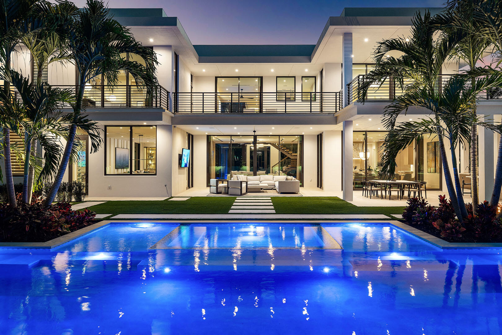 481 Thatch Palm Drive Boca Raton, FL 33432 - Photo 81 of 98 481_Thatch_Palm_Drive_Dusk_08