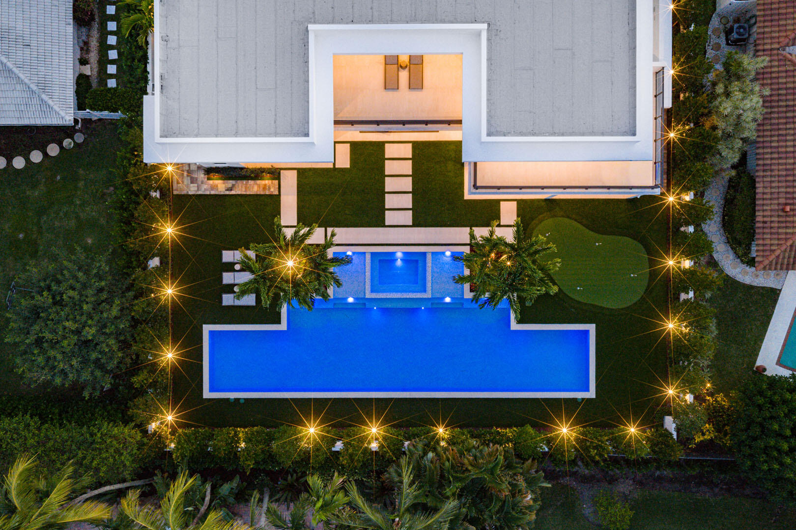 481 Thatch Palm Drive Boca Raton, FL 33432 - Photo 90 of 98 481_Thatch_Palm_Drive_Dusk_31